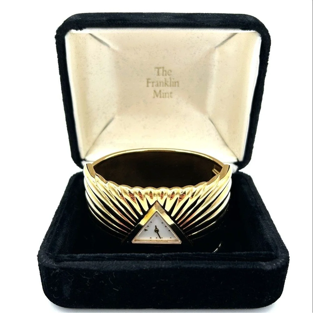 Vintage 80s The Franklin Mint Women's Gold Tone Ribbed Cuff Bracelet Watch 1988